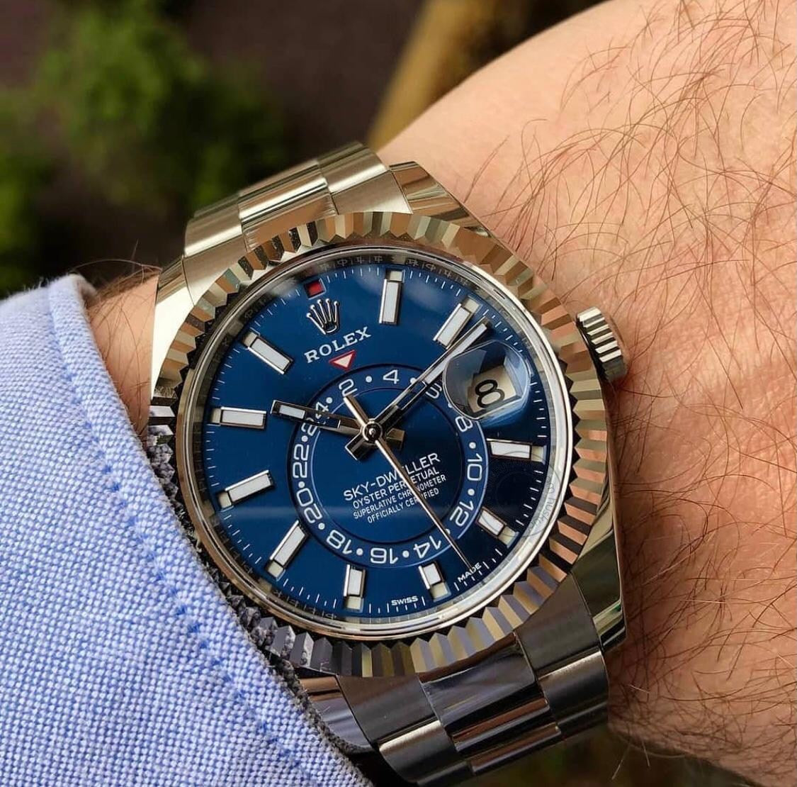 Oyster Perpetual Sky-Dweller in White Rolesor with a bright blue dial and an Oyster bracelet. RLX Sky-Dweller RLX-DWELLER